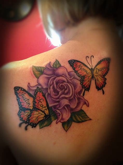 Butterfly On Flower Tattoo Designs