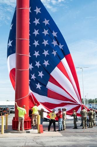 Fort Wayne Dealership Raises Flag On Pole Replacing One That Broke In 2022 Winter Storm Local