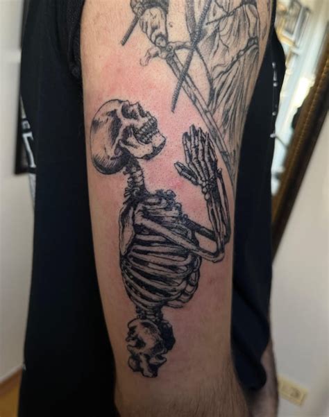 Praying Skeleton Tattoo