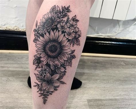 Premium Photo A Tattoo Of A Flower On A Leg With A Flower On It