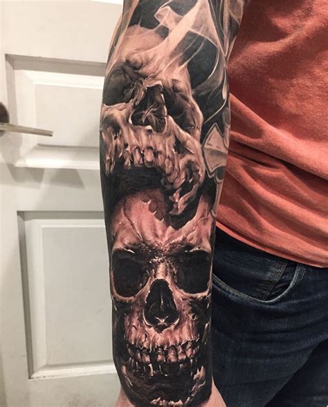 Skulls Half Sleeve Tattoo Design