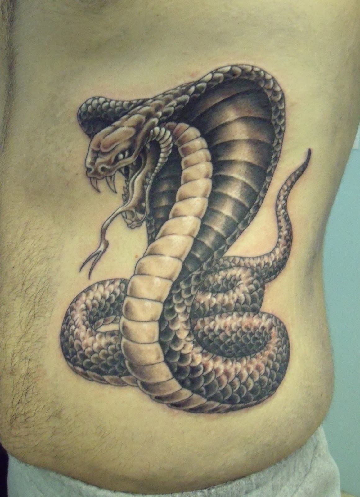 Snake Tattoos On The Back