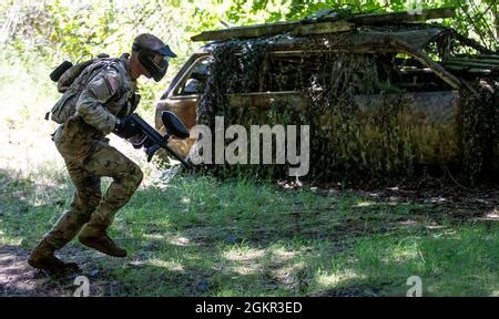 Spc Zachery Smith From Tripler Army Medical Center Dashes For Cover During The Paintball Challenge Of The Regional Health Command Pacific S Best Leader Competition Thursday June 17Th 2021 At Joint Base Lewis Mcchord The