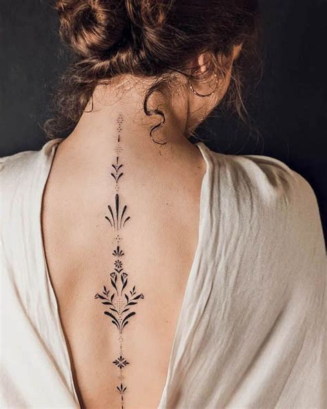 The Complete Guide To Spine Tattoos: Uncover The Ultimate Designs