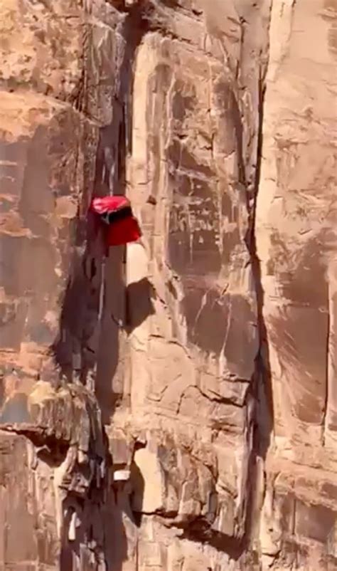 Video Captures Base Jumper Dangling From Utah Cliff