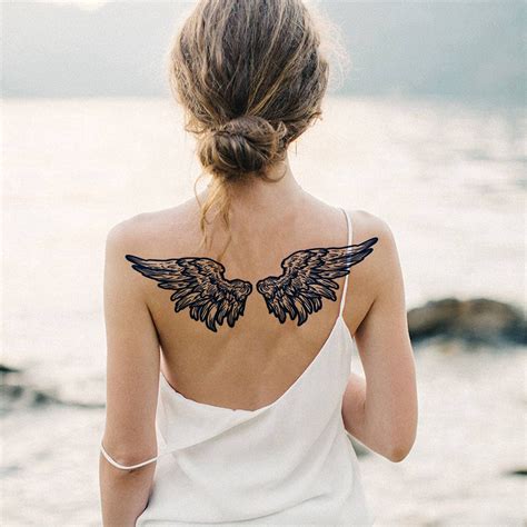 Wings On The Back Tattoo